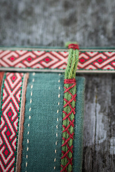Handmade stitching over the linen pouch "Fireside Family"